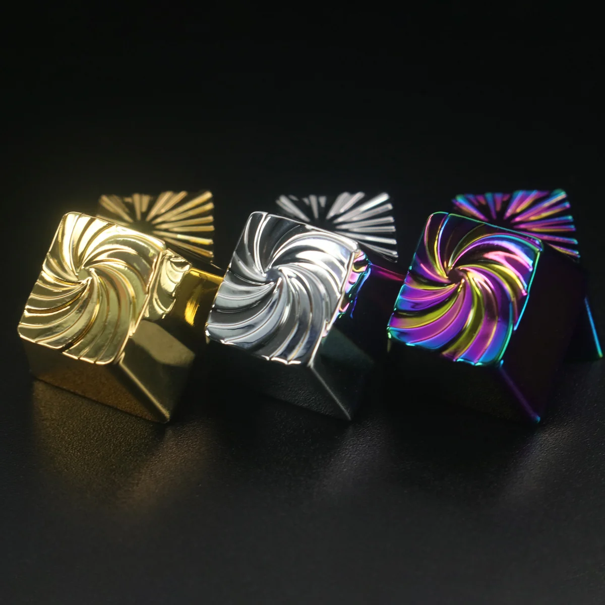 Vortex Series Keycaps crafted from premium zinc-aluminum alloy, displaying dynamic swirling patterns and a captivating color-shifting luster.