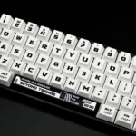 Exclusive Warframe PBT gaming keycaps set displayed from multiple angles, showcasing intricate futuristic sci-fi art and character motifs.