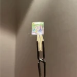 Detailed view of the Valorant: Waylay Skill Keycap from an elevated angle, highlighting its dynamic geometric facets and vibrant design.