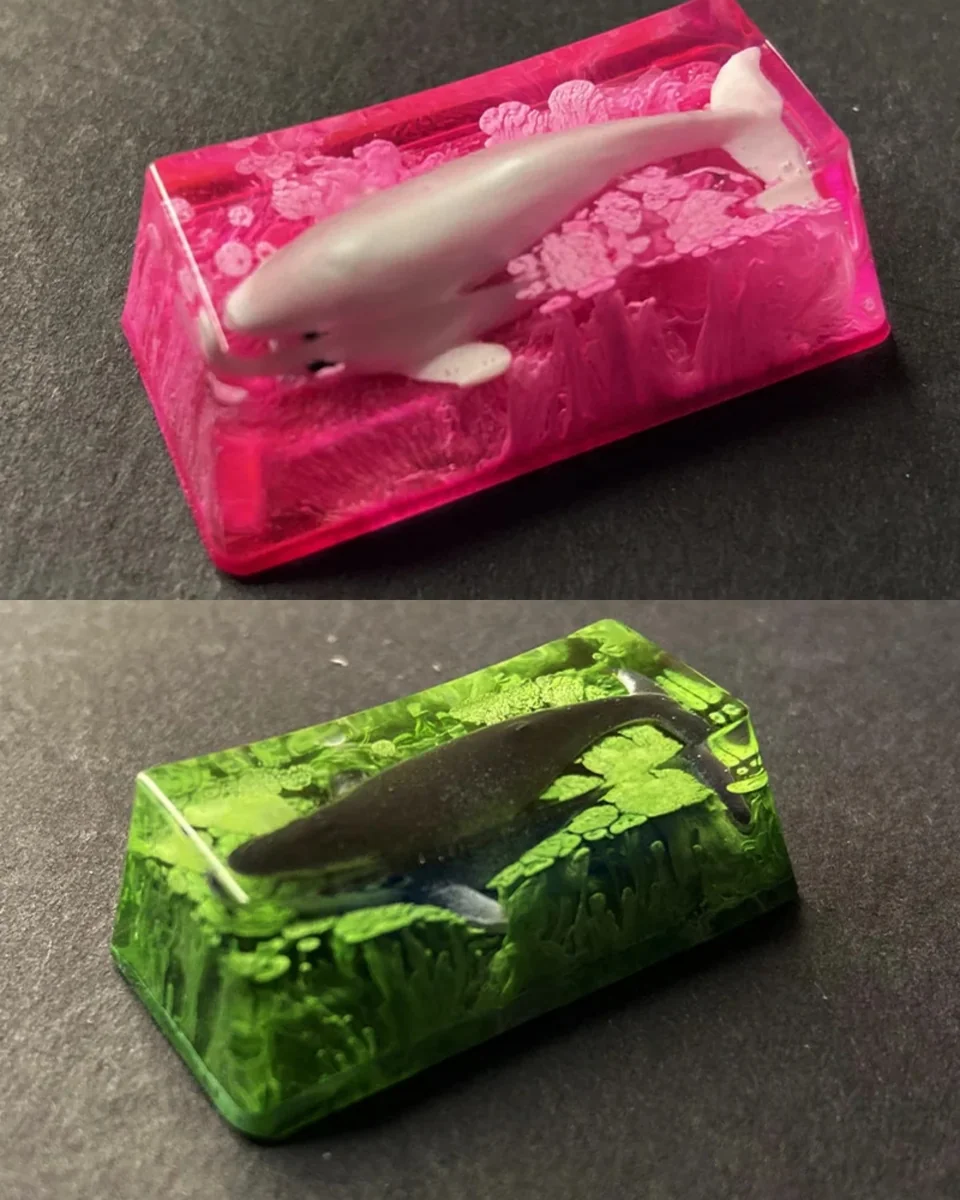 Ethereal handcrafted translucent Whale Fall Keycap, a unique artisan creation depicting a serene deep-sea diorama with glowing luminescence.