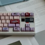 An enchanting angle of the Wonderland PBT keycaps set, displaying vibrant whimsical storybook art and durable PBT texture. Perfect for fantasy setups.