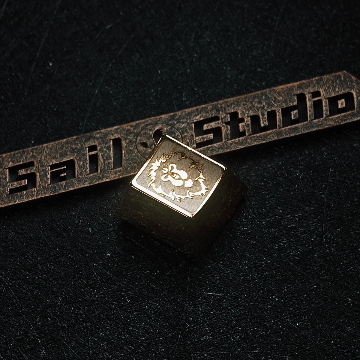 Close-up of a premium metal World of Warcraft Horde faction keycap, meticulously crafted with an iconic symbol and a striking metallic finish.