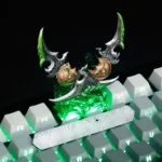 Iconic hand-painted artisan Warglaives World of Warcraft keycap. Metallic dark fantasy details from various angles show premium quality.