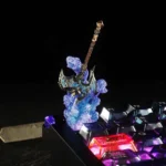 Highly detailed metal WoW Shadowmourne keycap, a legendary World of Warcraft weapon replica with a unique detachable axe feature.