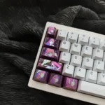 Exquisite Zero Two titanium keycap, 1.5u Tab anime art piece, shown from various angles. Meticulously sculpted details highlight this ultimate collectible design.