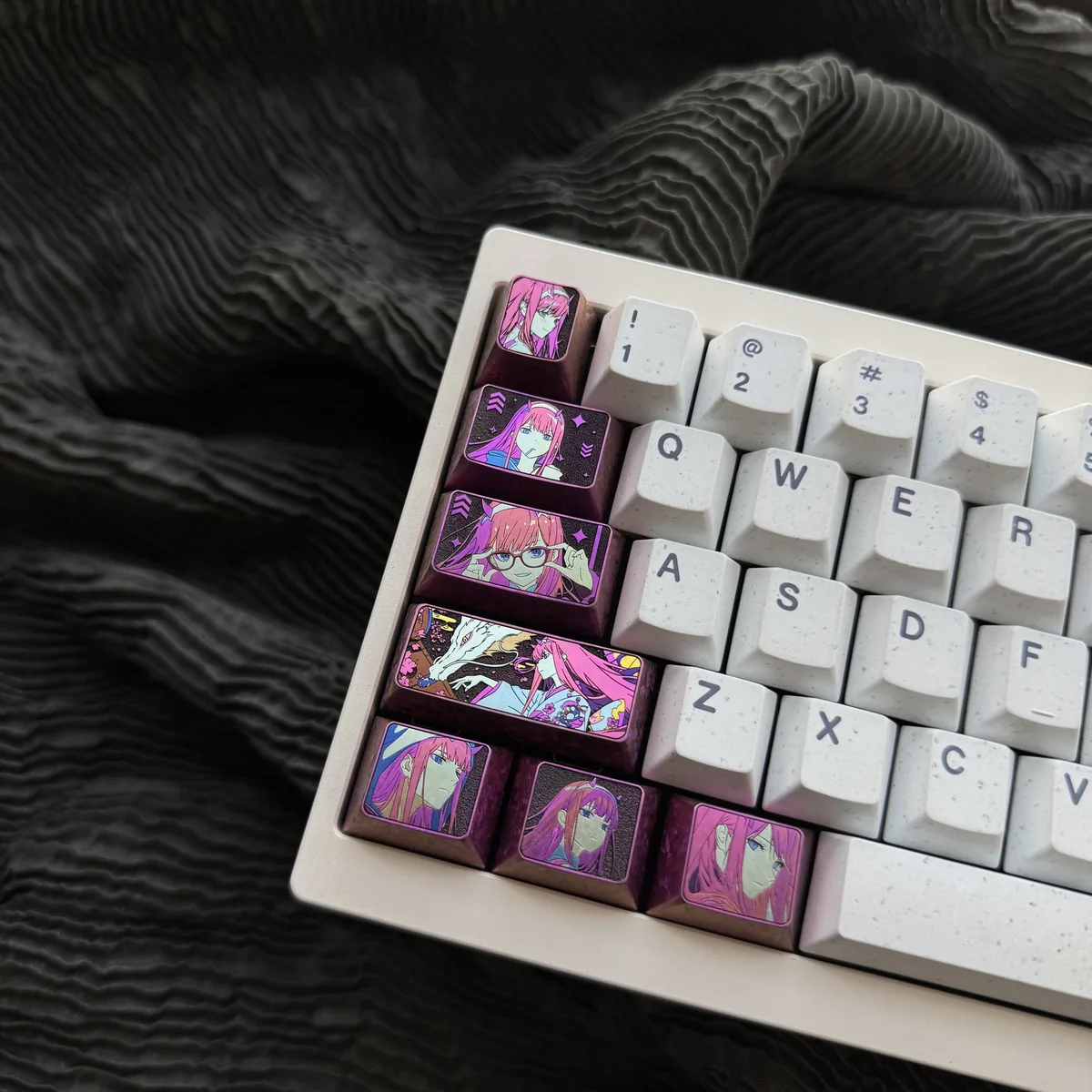 Exquisite Zero Two titanium keycap, 1.5u Tab anime art piece, shown from various angles. Meticulously sculpted details highlight this ultimate collectible design.