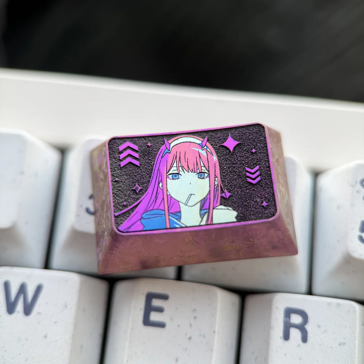 Exquisite Zero Two Titanium Keycap, a meticulously sculpted 1.5u Tab anime art piece for ultimate collectors, showcasing iconic character detail.