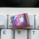 Detailed gallery of the Iconic Zero Two Titanium Keycap, showcasing its premium titanium alloy, vibrant anime art, and sleek metallic finish from multiple angles.