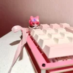 Handcrafted Zoya Pomchenkova Cat artisan keycap, displaying its stylized feline design and mystical gaming lore from diverse angles.