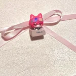 A detailed view of the enchanting Zoya Pomchenkova cat artisan keycap, handcrafted with mystical charm, presented from a dynamic three-quarter angle.