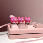 Zoya Pomchenkova Cat Artisan Keycap, handcrafted with unique gaming lore. Multiple views highlight its stylized feline design and mystical charm.