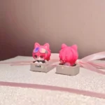 Experience the artisan keycap, a handcrafted Zoya Pomchenkova creation featuring a stylized, mystical cat figurine embodying playful design.