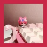 Premium Zoya Pomchenkova artisan keycap featuring a playful, handcrafted cat figurine with enchanting gaming lore detail.