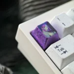 Vivian Banshee Titanium Zenless Zone Zero keycap, featuring a close-up view of its intricate sci-fi design and sleek metallic finish.