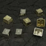 26 Alphabet OEM Supplement Keycap Set, premium and weighty, shown from various angles. Polished finishes and artisanal details elevating keyboards.