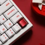 Limited Edition Heart Keycap in polished CNC aluminum, R4 profile, shown from a refined angle. Its minimalist heart design showcases premium craftmanship.