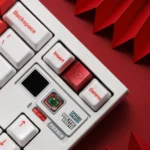 Close-up of a premium, limited edition CNC aluminum heart keycap, showcasing its polished finish and minimalist design for elegant romance.