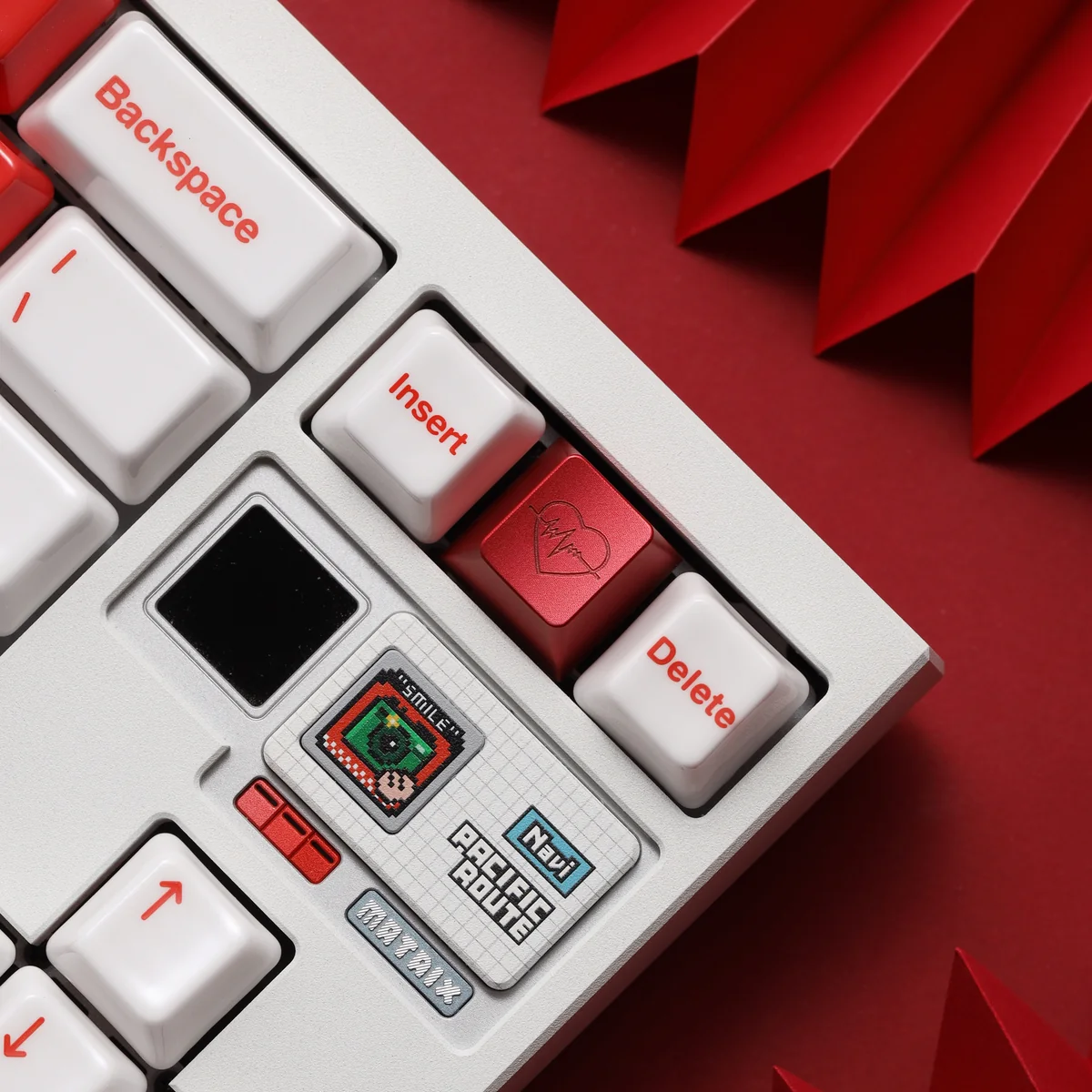 Close-up of a premium, limited edition CNC aluminum heart keycap, showcasing its polished finish and minimalist design for elegant romance.