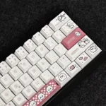 Adorable Pink Puppy PBT Keycap Set for mechanical keyboards. View cute pink puppy motifs, soft pastels, and charming cartoon style from all angles.
