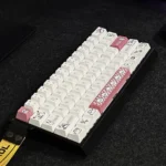 Adorable Pink Puppy PBT Keycap Set for mechanical keyboards, showing cute pastel puppy motifs from various angles, creating a whimsical desktop.