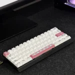 Adorable Puppy Cherry Keycap Set for mechanical keyboards, showcasing cute pastel puppy designs on a whimsical desktop.