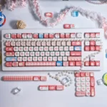 Close-up of an adorable PBT MOA cute keycap set, showcasing whimsical dye-sub designs in soft pastel colors, perfect for a cozy afternoon chat theme.