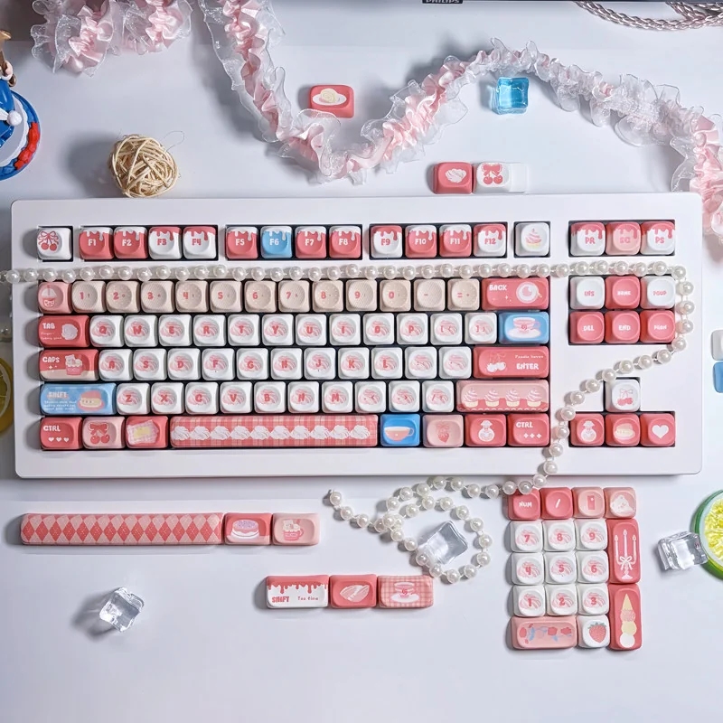 Close-up of an adorable PBT MOA cute keycap set, showcasing whimsical dye-sub designs in soft pastel colors, perfect for a cozy afternoon chat theme.