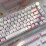 A detailed view of several Aikatsu! PBT keycaps set, revealing vibrant anime characters and joyful musical motifs from the complete 130-key set.
