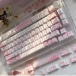 Vibrant Aikatsu! PBT keycaps set, featuring cheerful anime idol characters and musical motifs. Durable 130-key set for playful anime fans.