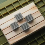 Close-up of premium CNC aluminum retro Arrow Key keycaps from multiple angles, showcasing their sleek, precision-machined finish.