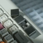 Premium CNC Aluminum Retro Arrow Key Keycaps gallery. See sleek, precision-machined aluminum from varied angles, highlighting retro-industrial design.