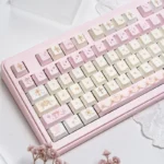 Angel's Lies Cherry Keycap Set gallery, highlighting dreamy pastel shades and whimsical angelic motifs from multiple angles for personalized keyboard.