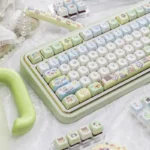 Multiple angles of the whimsical Animal Crossing PBT keycap set, featuring vibrant character designs and island elements for a joyful desktop.