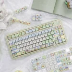 Close-up views of the whimsical Animal Crossing PBT keycap set, displaying vibrant island designs and beloved characters from multiple perspectives.