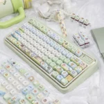 The whimsical Animal Crossing PBT keycap set displayed from multiple angles, featuring vibrant characters and playful island elements for a joyful design.
