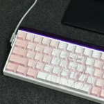 Artisanal Apricot Cherry Keycap Set, crafted from premium backlit. Showcases original characters, side-illuminated legends, and a soft design.