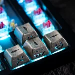 Artistic close-ups of handcrafted luminous lightning keycaps. Multiple angles reveal industrial-artisan fusion, glowing lightning motif.