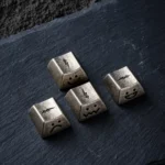 Multi-angle views of Handcrafted Luminous Lightning Keycaps. Showcases raw material, glowing lightning, and artisan details, fusing industrial-art.