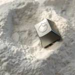 Handcrafted whimsical aluminum sleeping cat artisan ESC keycap displayed from various artistic angles, showcasing its serene metallic design.