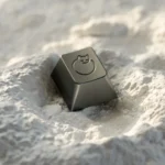 Side profile of the whimsical aluminum sleeping cat artisan ESC keycap, highlighting its intricate handcrafted details and premium metallic luster.