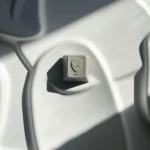 Premium CNC aluminum artisan keycap, detailed side view. Intricate pyramid and alien designs evoke a mysterious, futuristic aesthetic.