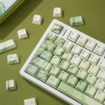 Bamboo PBT Keycaps Set, serene nature-inspired design with minimalist bamboo motifs and elegant green hues, viewed from multiple angles.
