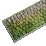 Serene, nature-inspired Bamboo PBT Keycaps Set with elegant green hues and minimalist bamboo motif create a tranquil desktop aesthetic.