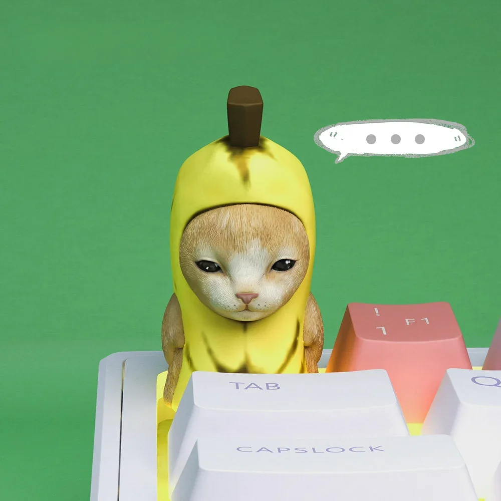 Adorable handcrafted Banana Cat Keycap for custom keyboards, a joyful artisan ESC key featuring a charming feline with a whimsical banana motif.