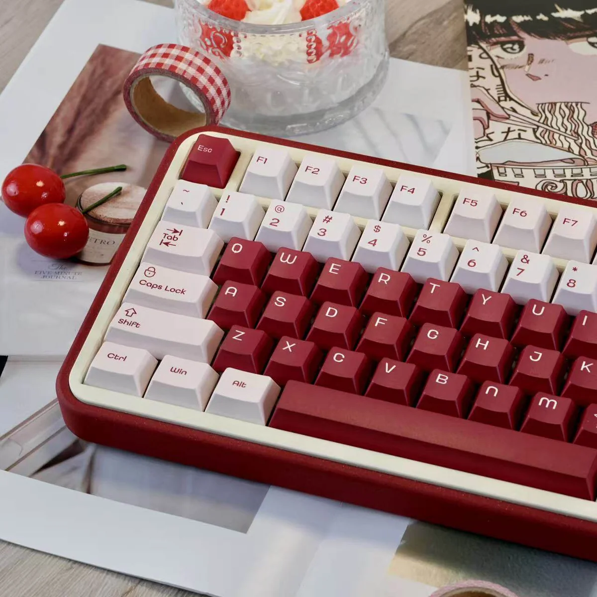 Vibrant red Berry Box PBT dye-sub keycap set, showcasing charming strawberries and playful box motifs from a clear angle, adding a sweet touch.