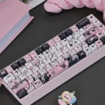 Sleek black cat artisan PBT keycap set, exquisitely crafted from a unique angle, highlighting its mysterious silhouette and playful elegance for keyboard.