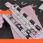 Close-up of the exquisite black cat artisan PBT keycap set, showcasing its sleek, mysterious silhouette and playful elegance, perfect for custom keyboard.