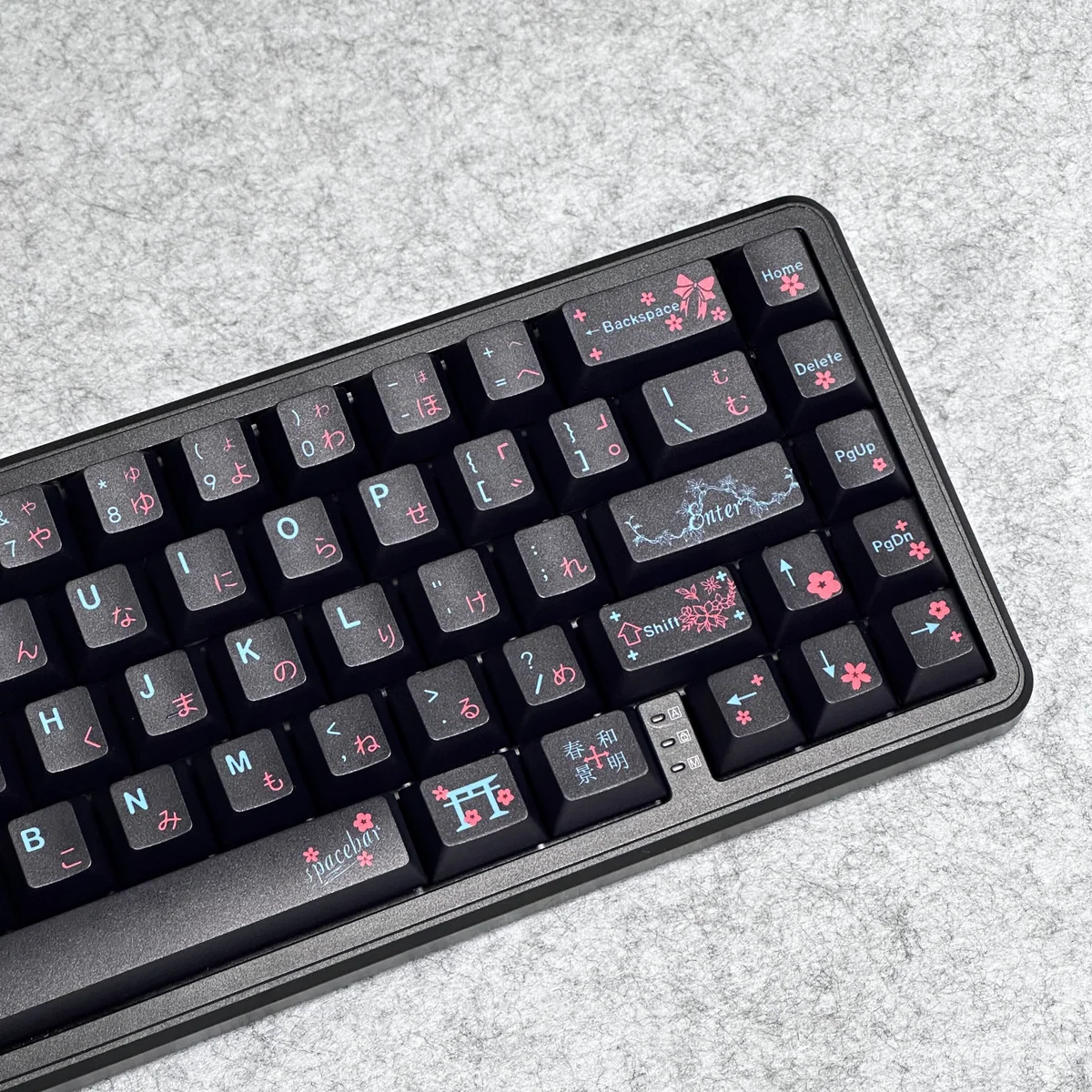 Serene black Japanese PBT dye-sublimated keycap set, shown from multiple angles, highlighting durable PBT, elegant natural motifs, and legends.