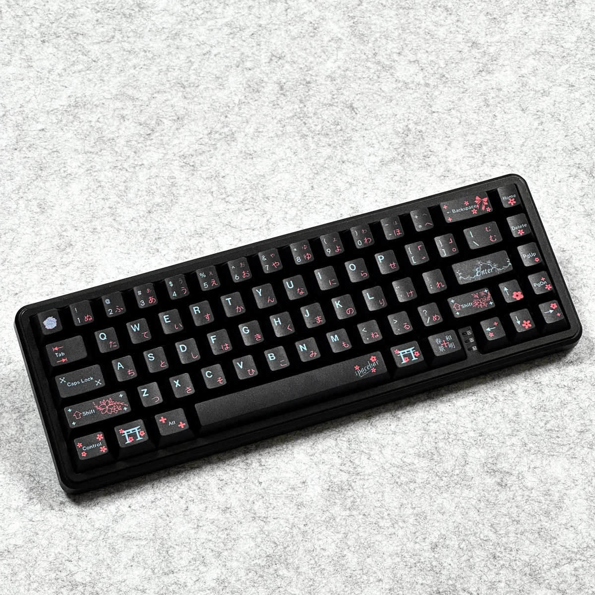 Serene black Japanese PBT dye-sublimated keycaps set, showcasing their durable PBT construction and elegant design with poetic natural motifs.