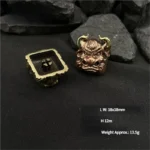 Close-up of the intricately hand-cast pure copper Black Myth Wukong artisan keycap, showcasing its gleaming finish and detailed mythical figure.